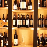 Large,Beautiful,Wooden,Shelf,With,Wine,In,The,Restaurant.,Milan