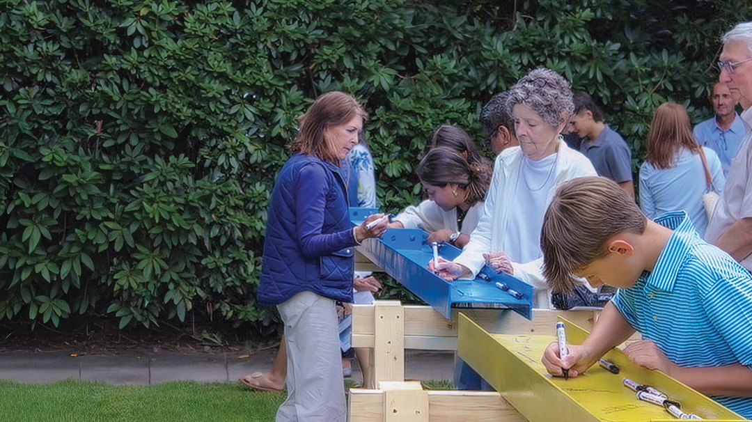 highlands-nc-Our-Lady-of-the-Mountains-signing-beams